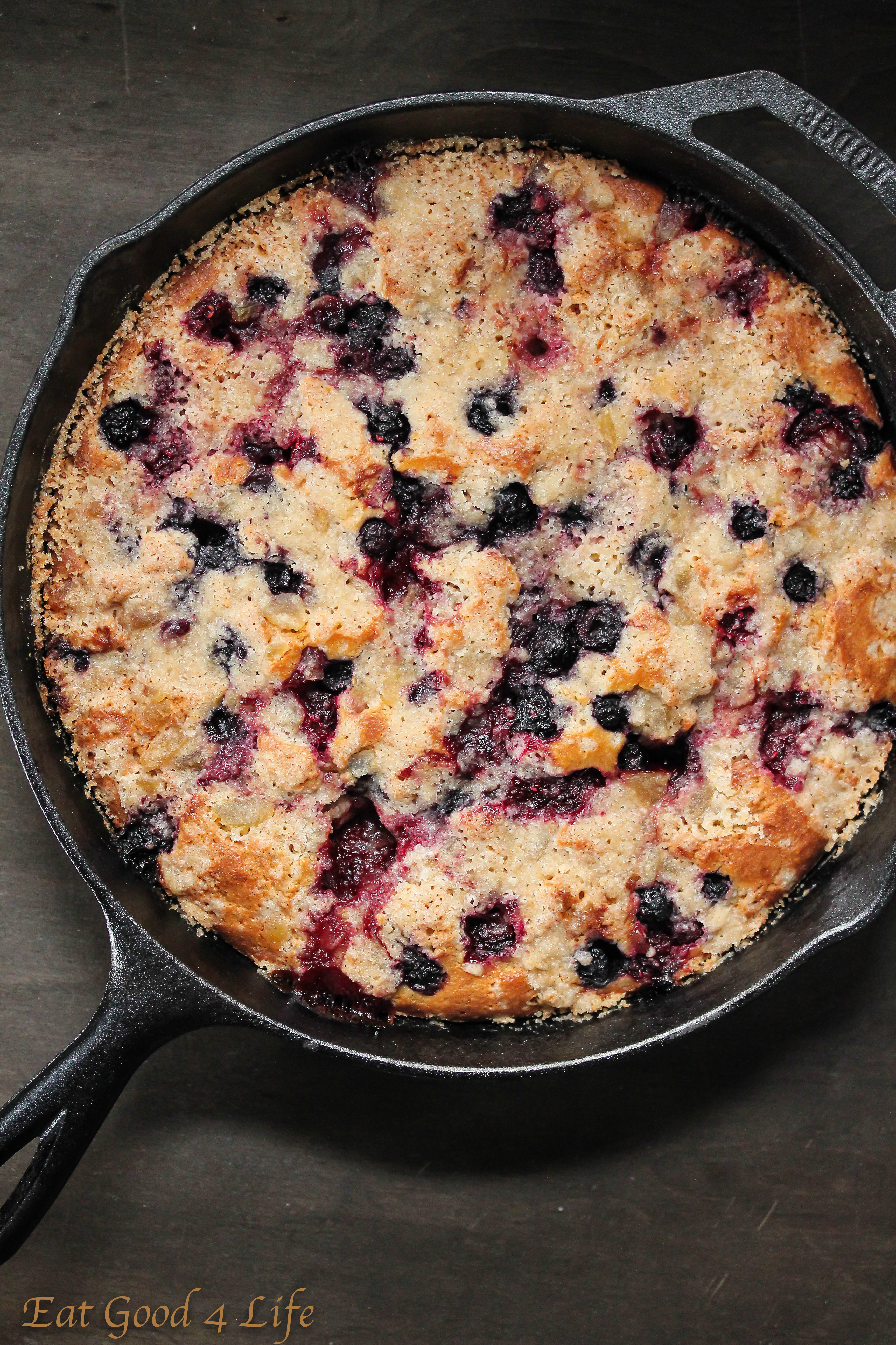 mixed berry and ginger crumb cast iron cake