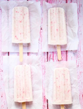 Strawberry and coconut popsicles