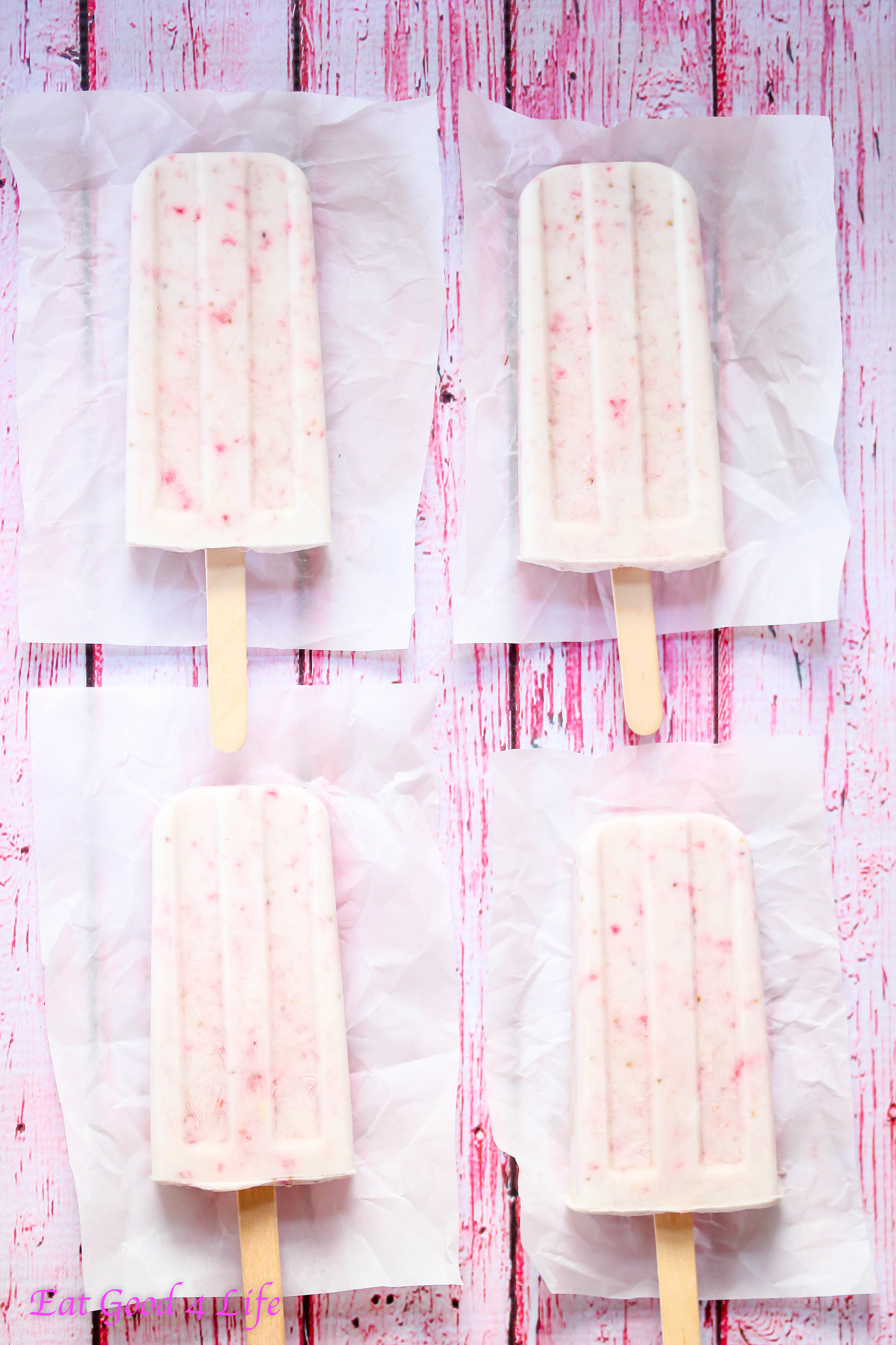 Strawberry and coconut popsicles