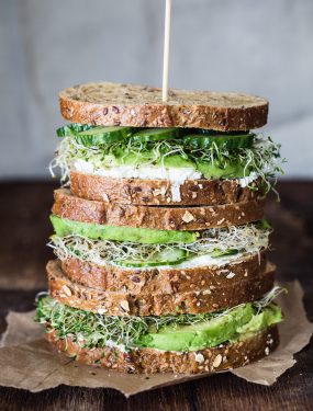 Avocado, cucumber, goat cheese sandwich