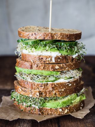 Avocado, cucumber, goat cheese sandwich