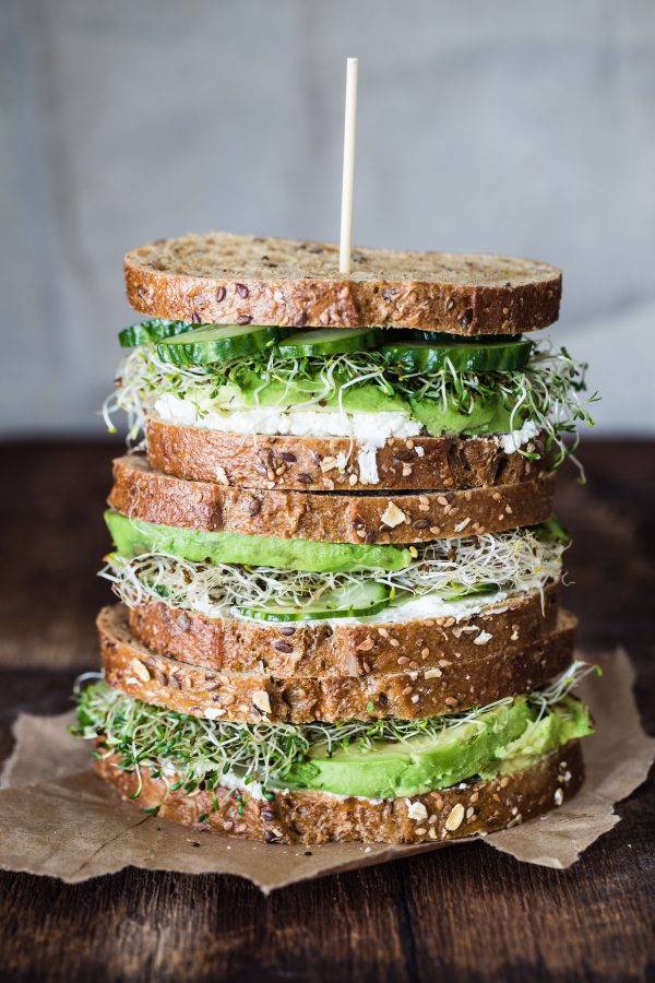 Avocado, cucumber, goat cheese sandwich