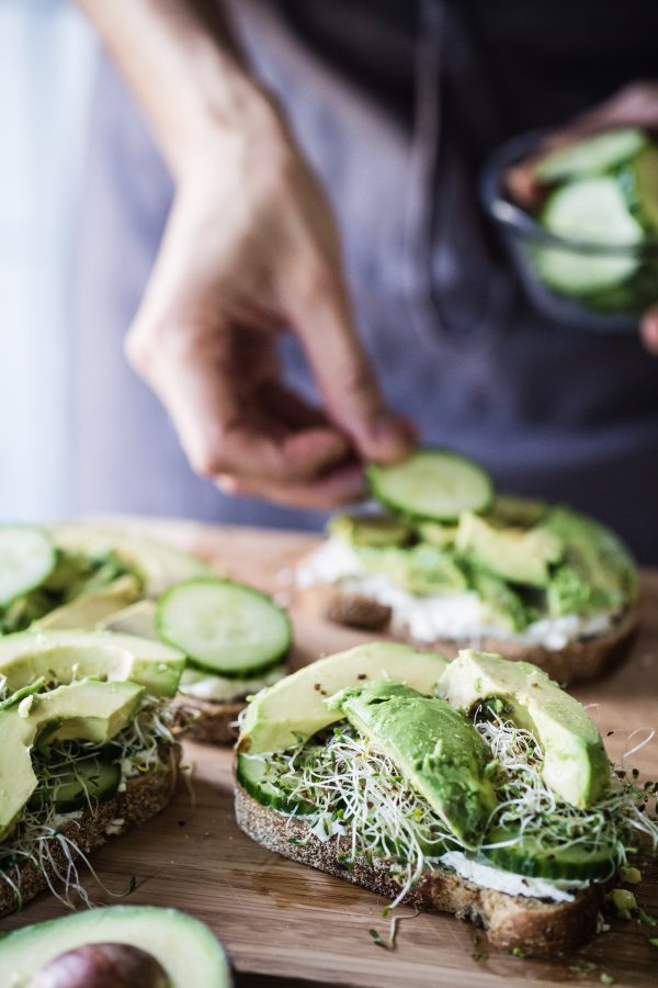 Avocado, cucumber, goat cheese sandwich